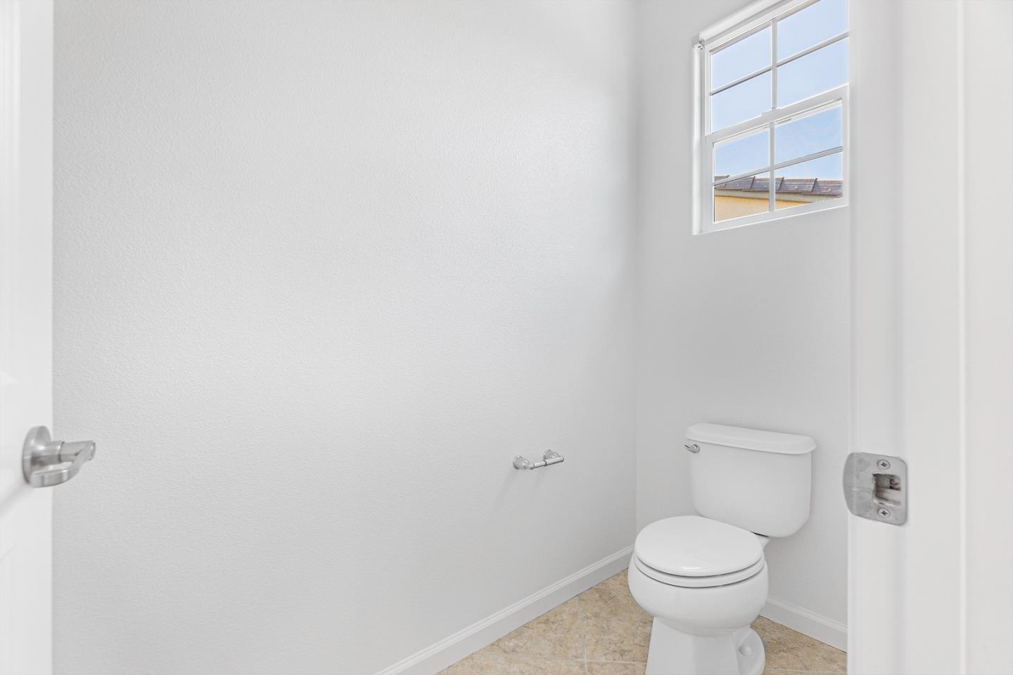 4232 Astor Hollow Street San Ramon, CA 94582 - Photo 21 of 37 a white toilet sitting next to a white cabinet