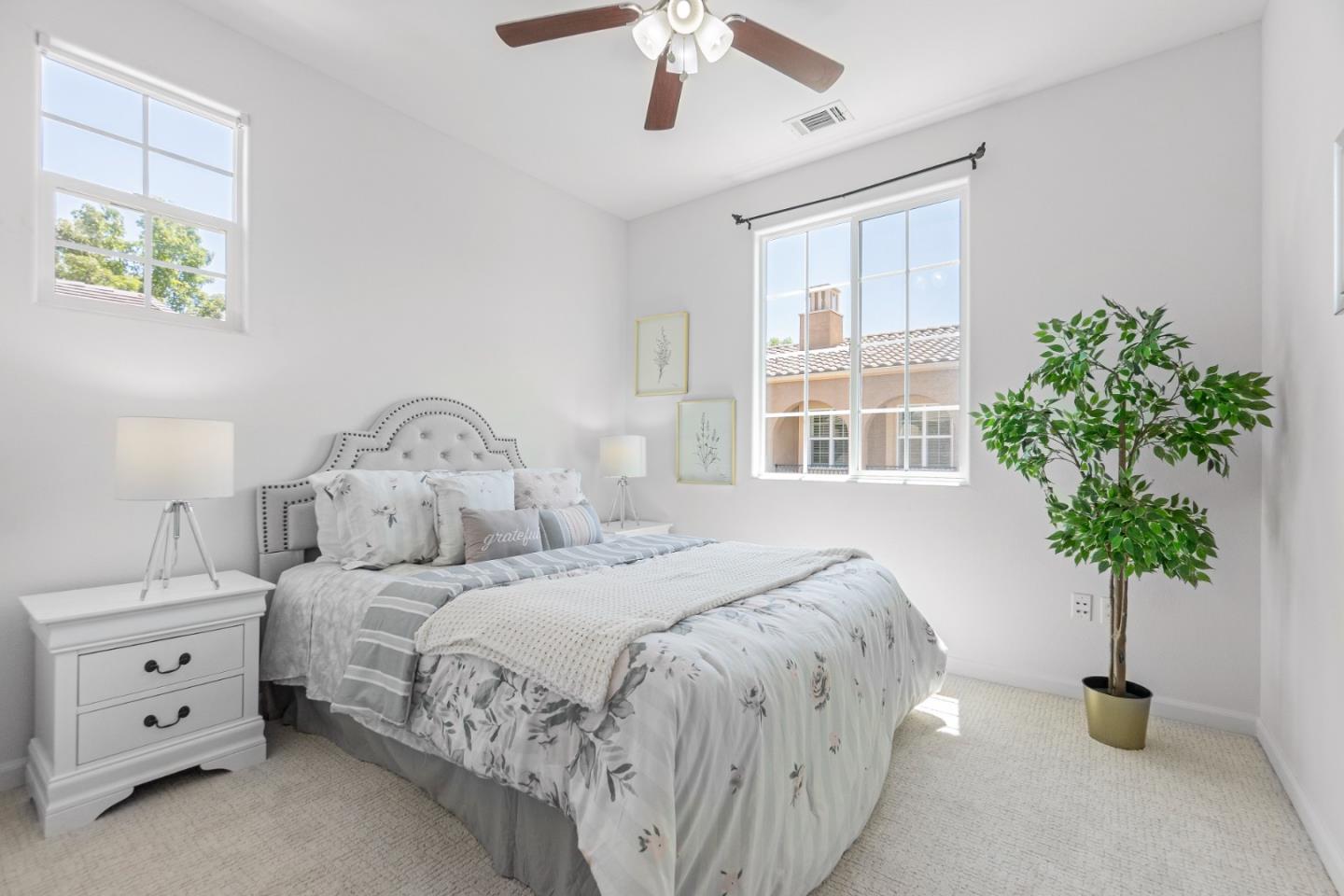 4232 Astor Hollow Street San Ramon, CA 94582 - Photo 27 of 37 a bedroom with bed and a potted plant