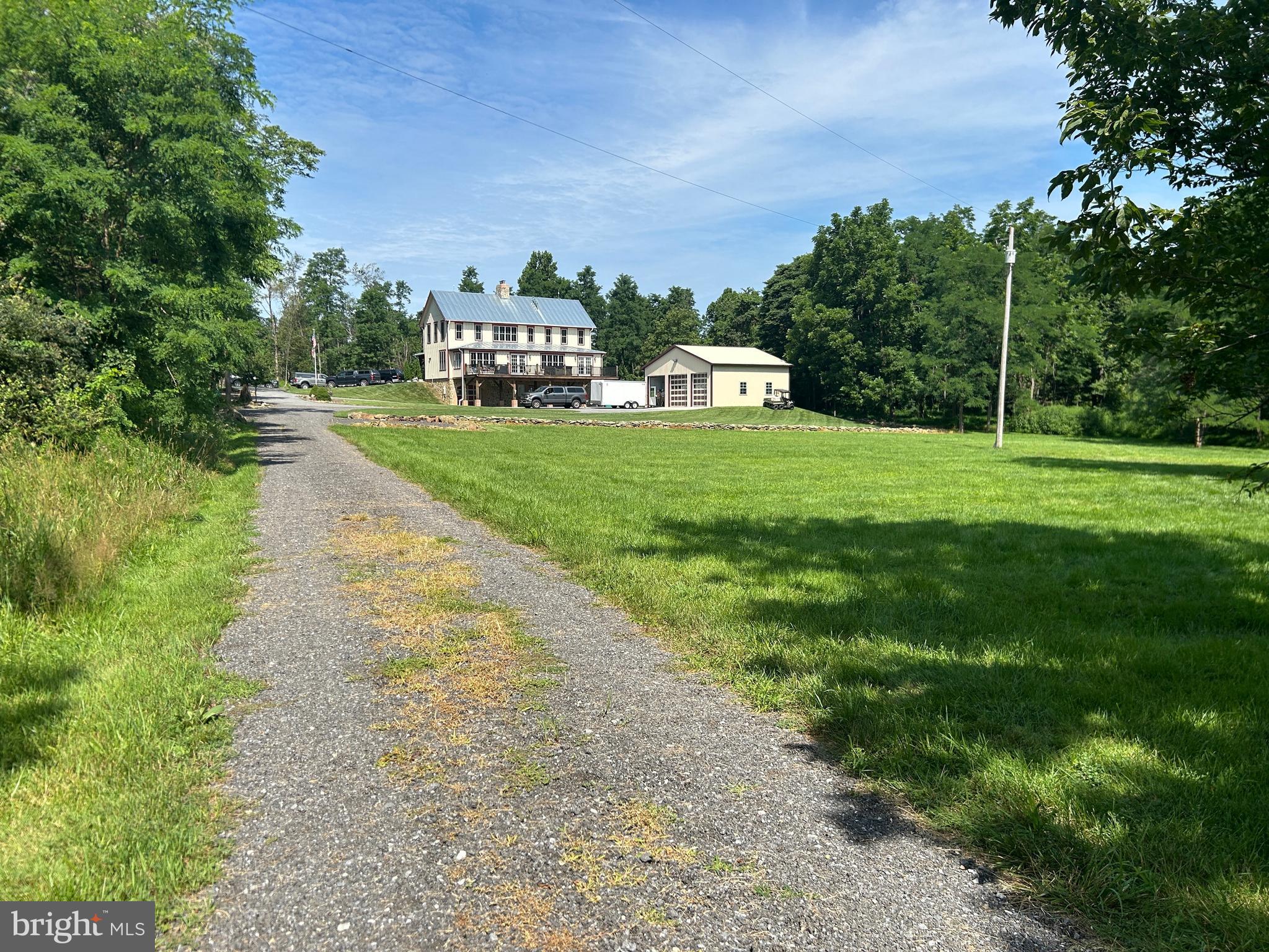 14301 Tower Road Smithsburg, MD 21783 - Photo 110 of 127 a view of a street with a houses in the background