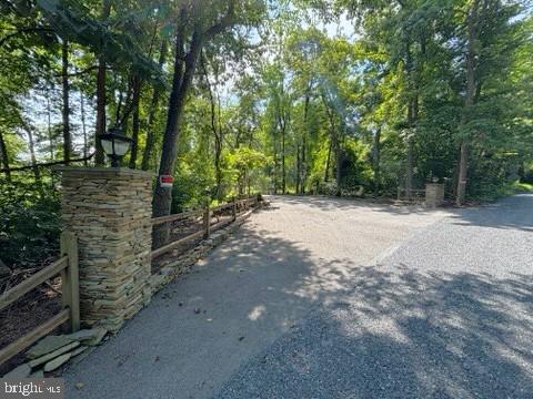 14301 Tower Road Smithsburg, MD 21783 - Photo 122 of 127 a view of a road with trees in the background