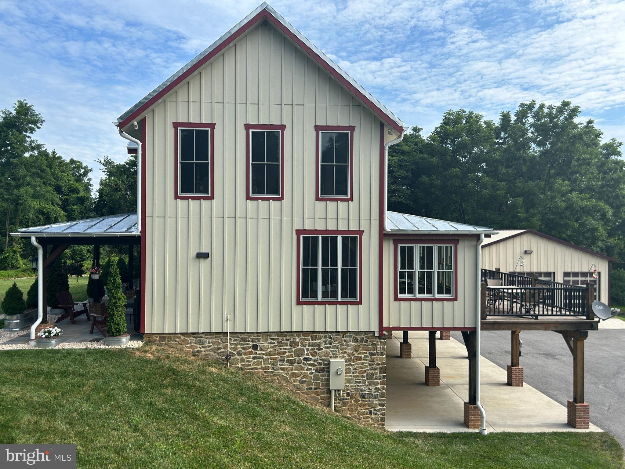 14301 Tower Road Smithsburg, MD 21783 - Photo 2 of 127 a view of a house with backyard and sitting area