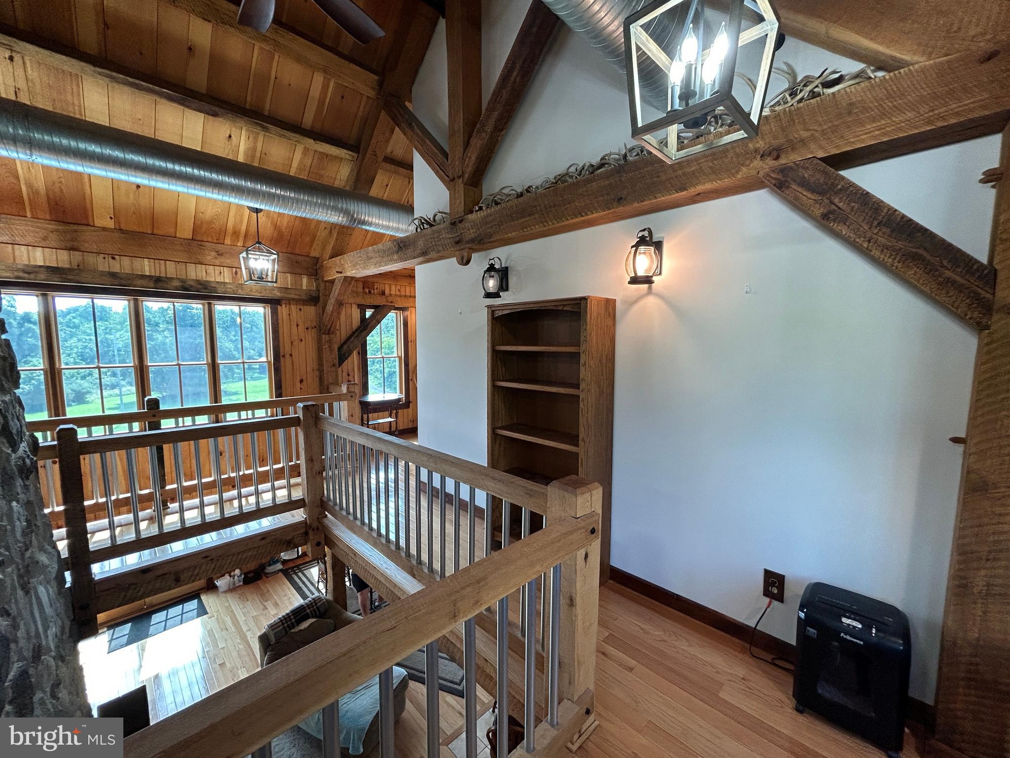14301 Tower Road Smithsburg, MD 21783 - Photo 43 of 127 a view of an empty room with wooden floor