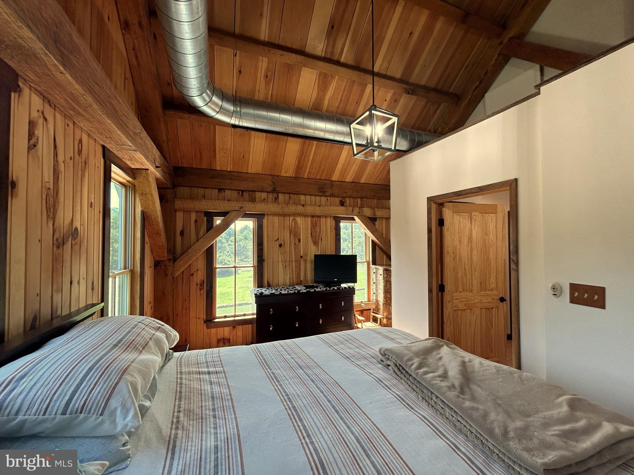 14301 Tower Road Smithsburg, MD 21783 - Photo 54 of 127 a bedroom with a bed and a large window