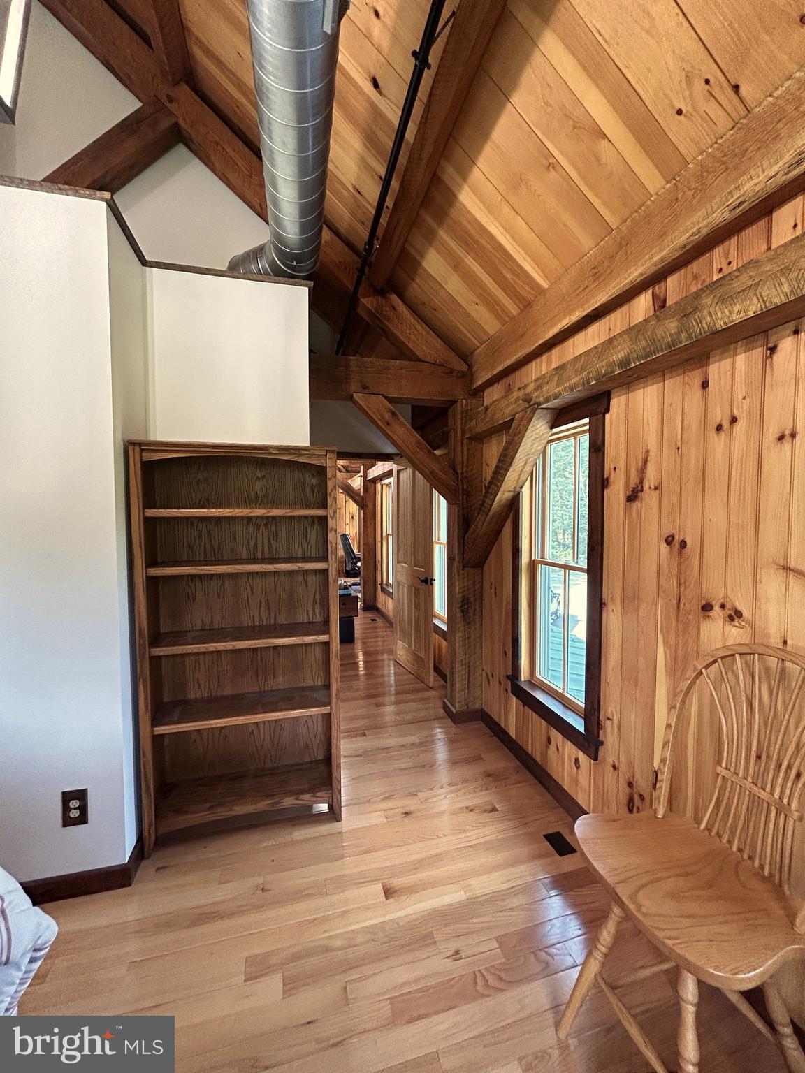 14301 Tower Road Smithsburg, MD 21783 - Photo 55 of 127 a view of an empty room with wooden floor and windows