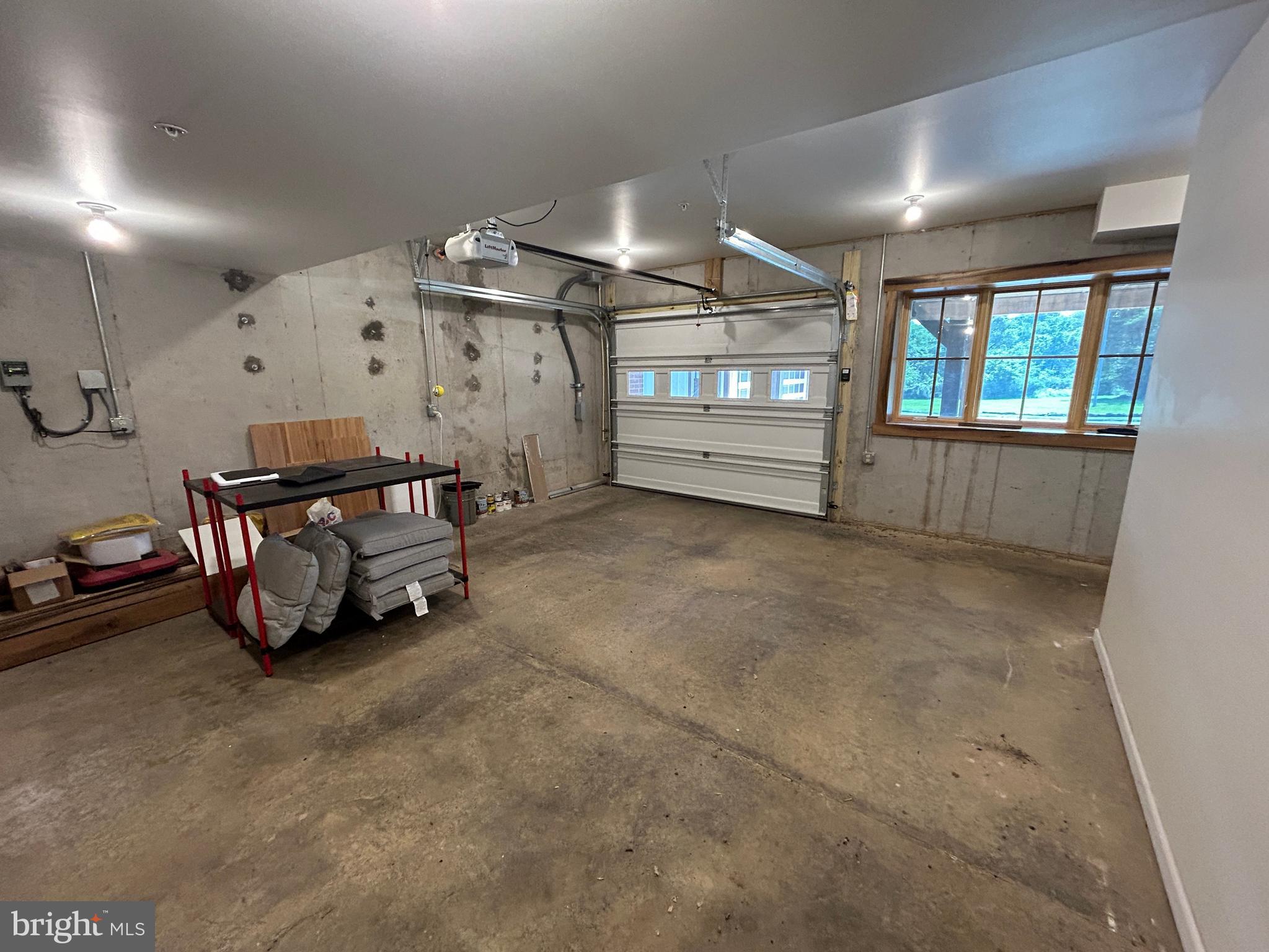 14301 Tower Road Smithsburg, MD 21783 - Photo 61 of 127 a spacious bedroom with a bed and a large window