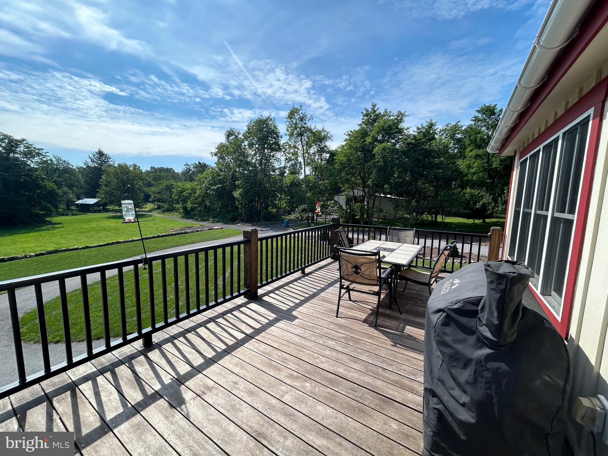 14301 Tower Road Smithsburg, MD 21783 - Photo 73 of 127 a view of balcony with wooden floor and seating space