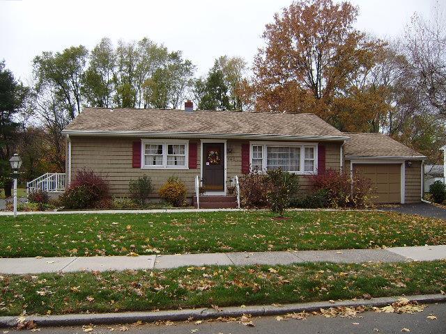 440 Plains Road Milford, CT 06461 - Photo 1 of 1 a front view of a house with a yard