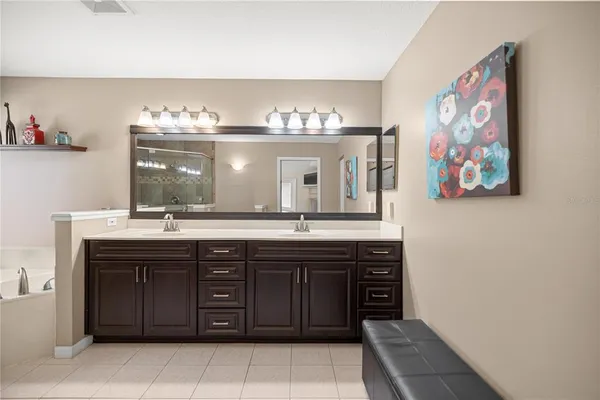 a workspace with furniture wooden floor and window