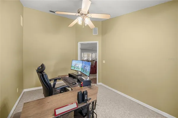 a bathroom with a sink a toilet and shower curtain