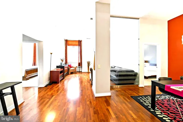 a living room with furniture and a table