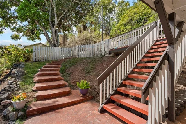a view of balcony and yard