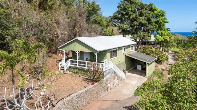 a car parked in front of a house