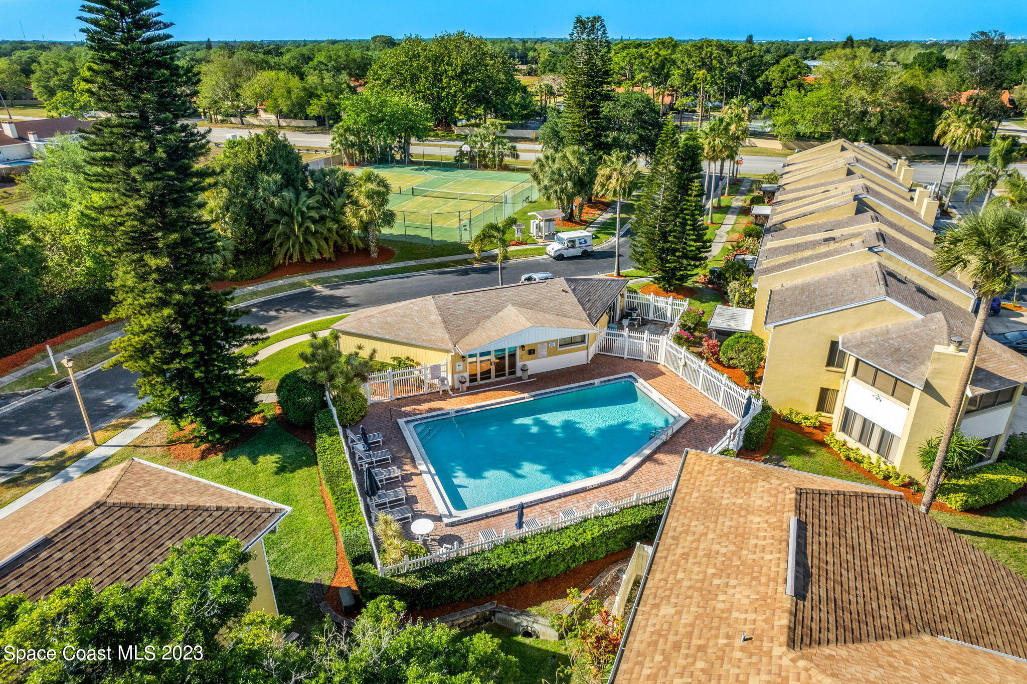 609 Cedar Side Circle Northeast Palm Bay, FL 32905 - Photo 15 of 19 an aerial view of a house with a garden