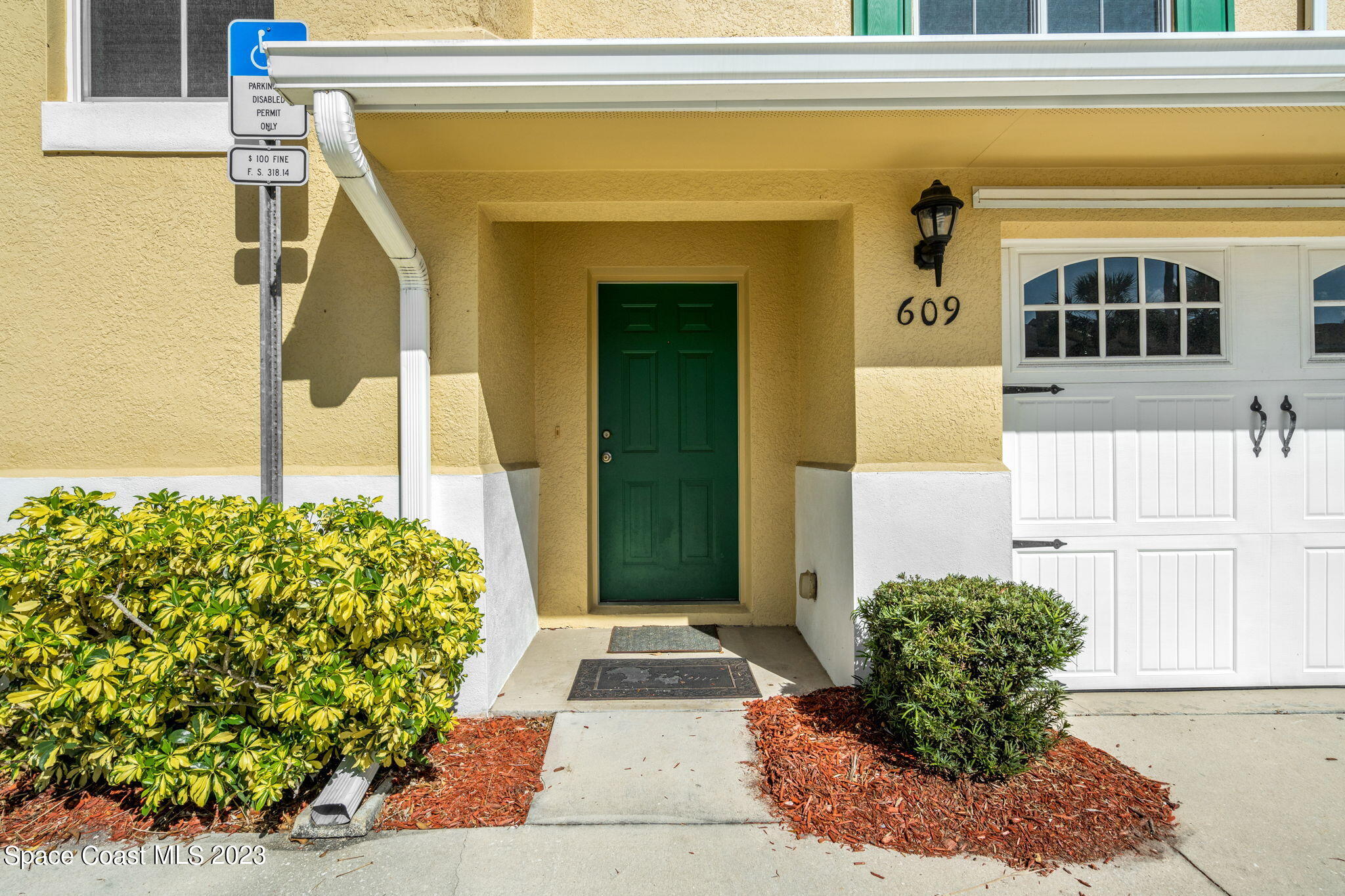 609 Cedar Side Circle Northeast Palm Bay, FL 32905 - Photo 2 of 19 a front view of a house