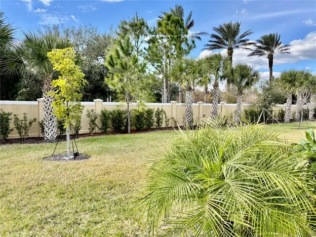 a view of swimming pool with a garden