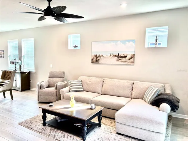 a living room with furniture and a couch