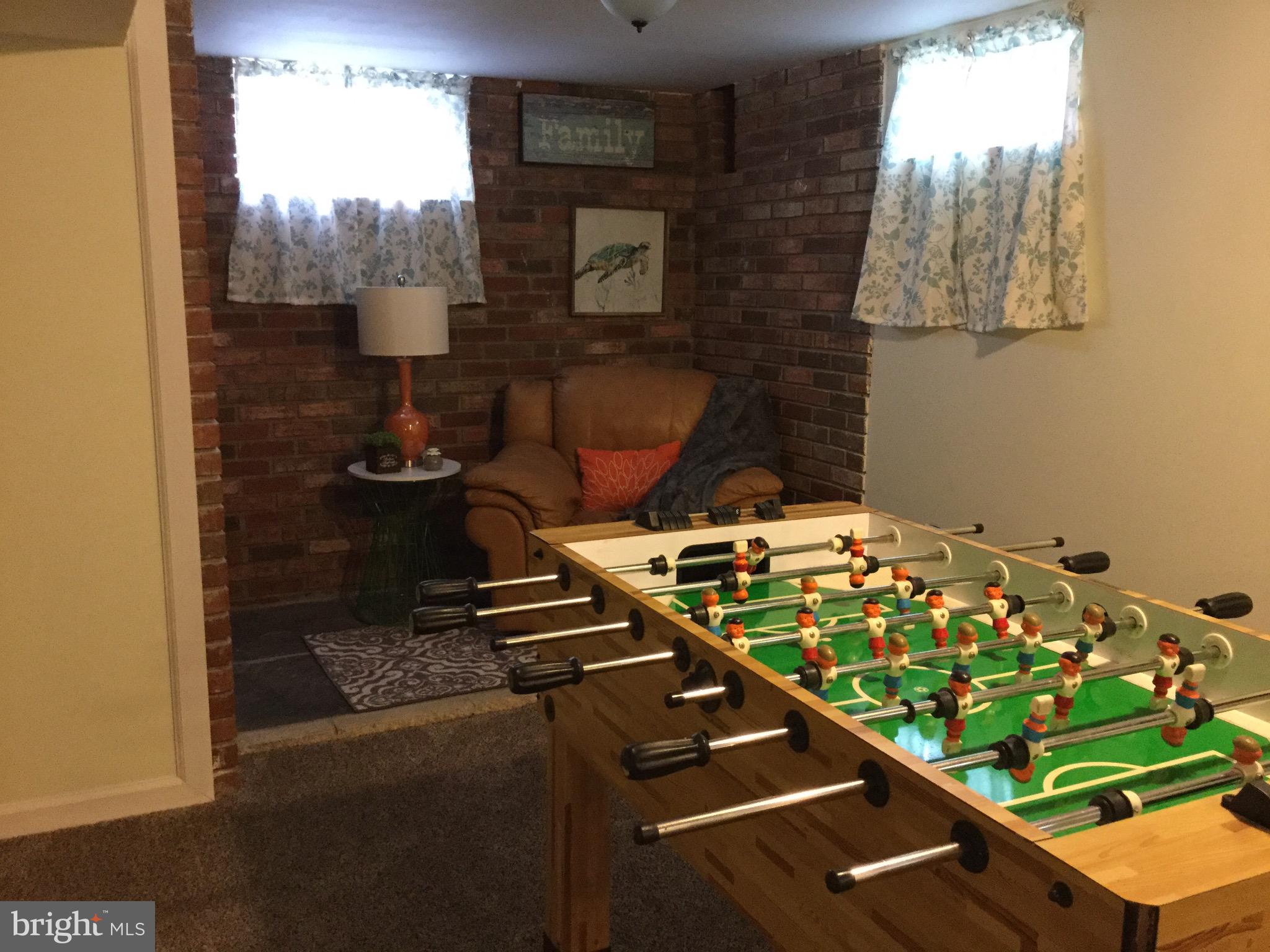 126 Roland Road Pasadena, MD 21122 - Photo 20 of 24 Reading and play area in family room