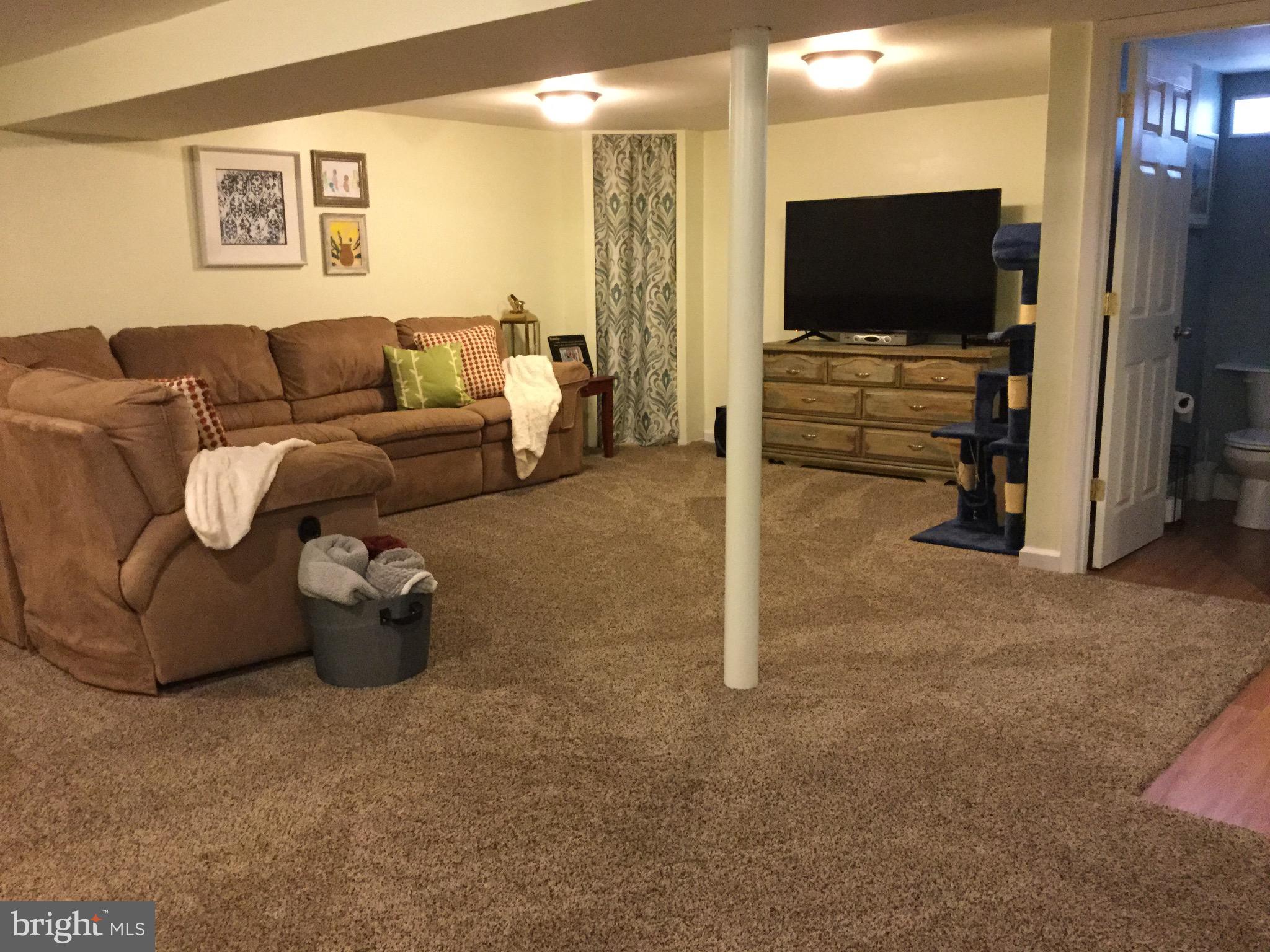 126 Roland Road Pasadena, MD 21122 - Photo 23 of 24 Spacious lower level family room