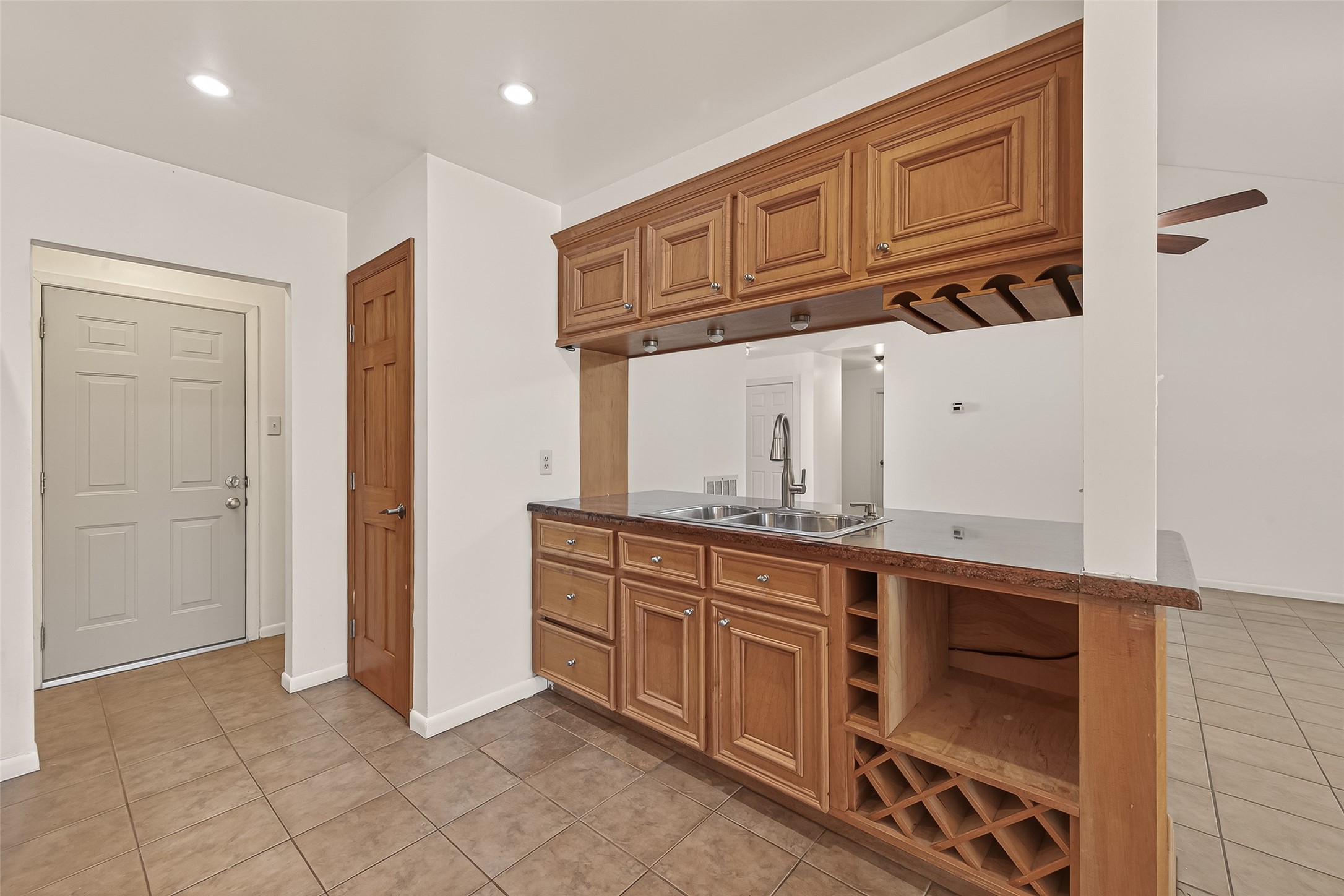 2510 Old Fort Road Sugar Land, TX 77479 - Photo 18 of 41 a kitchen with stainless steel appliances granite countertop a stove and a sink