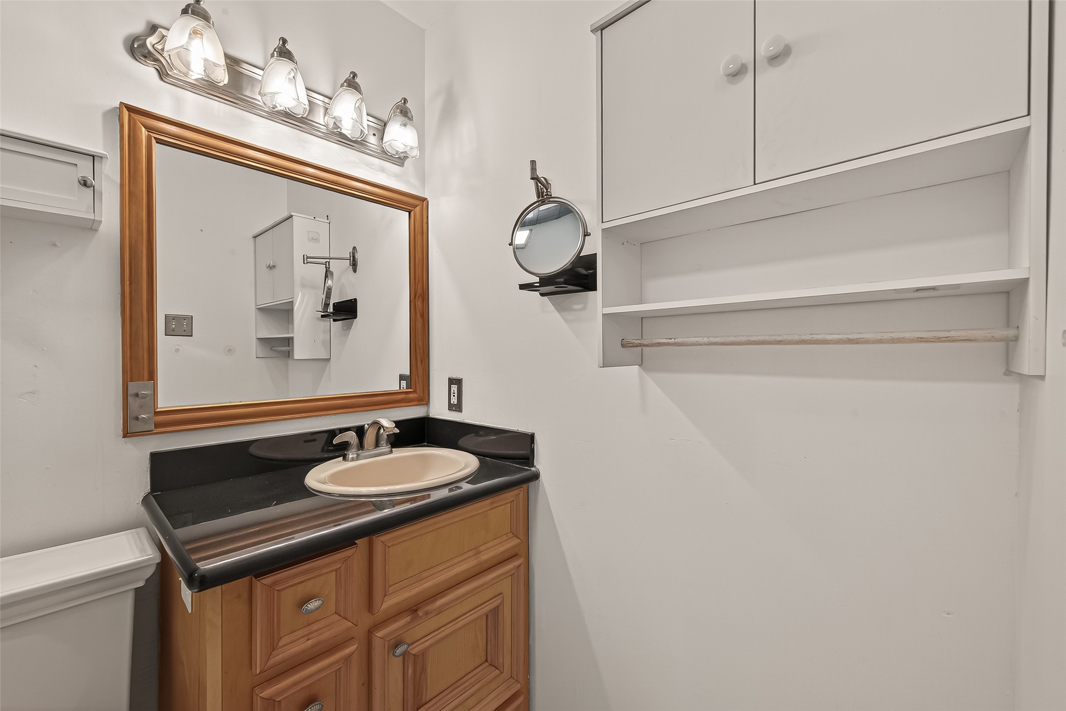 2510 Old Fort Road Sugar Land, TX 77479 - Photo 24 of 41 a bathroom with a sink and a mirror