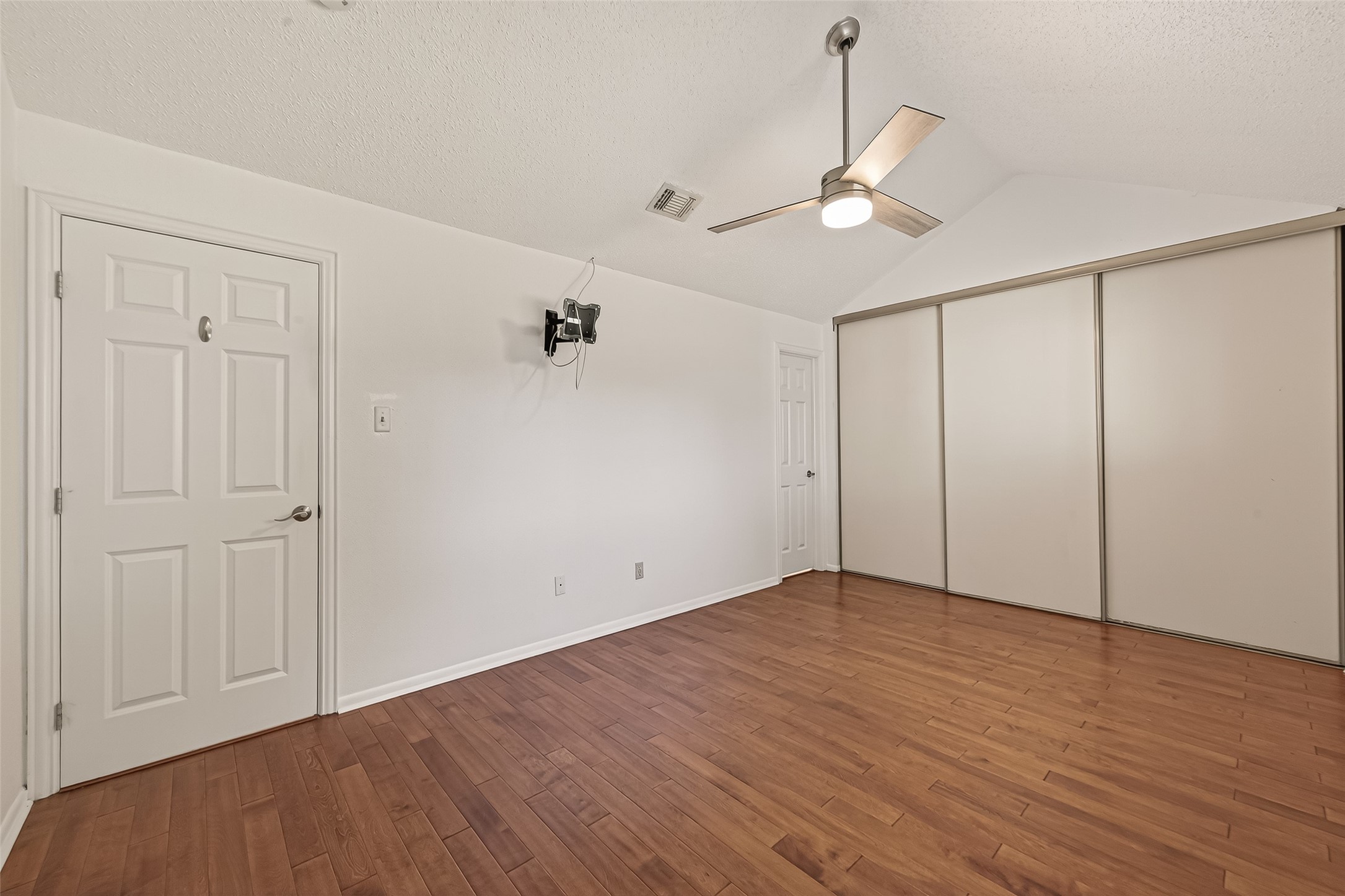 2510 Old Fort Road Sugar Land, TX 77479 - Photo 31 of 41 a view of an empty room with wooden floor
