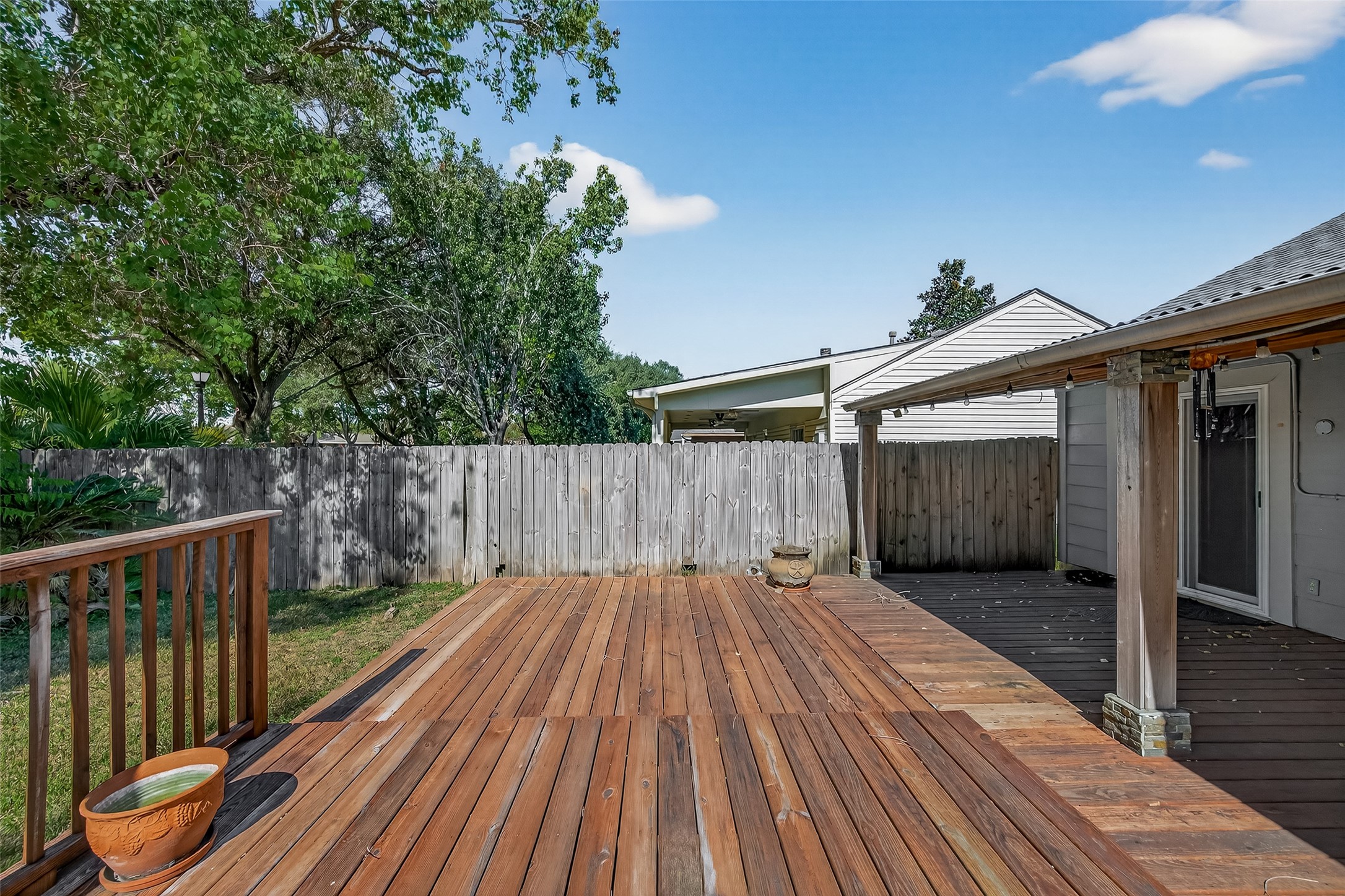 2510 Old Fort Road Sugar Land, TX 77479 - Photo 38 of 41 a view of backyard with a deck and wooden floor