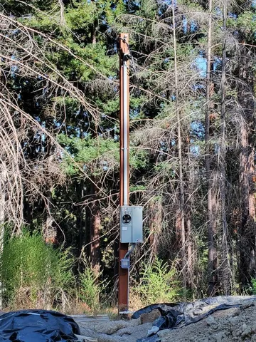 a street sign on a table next to a road