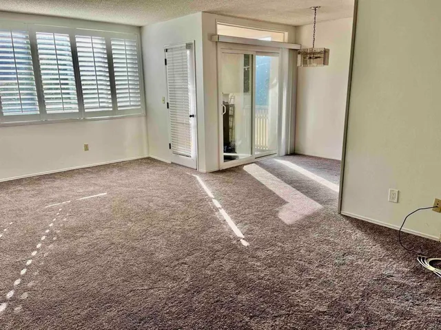a kitchen with sink cabinets and window