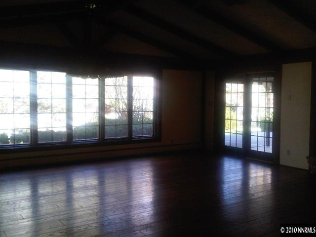 1840 Wendy Way Reno, NV 89509 - Photo 2 of 13 a view of room with wooden floor and windows