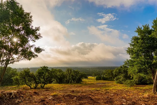 a view of swimming pool with a yard
