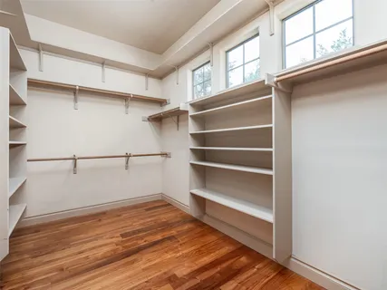 a view of an empty walk in closet
