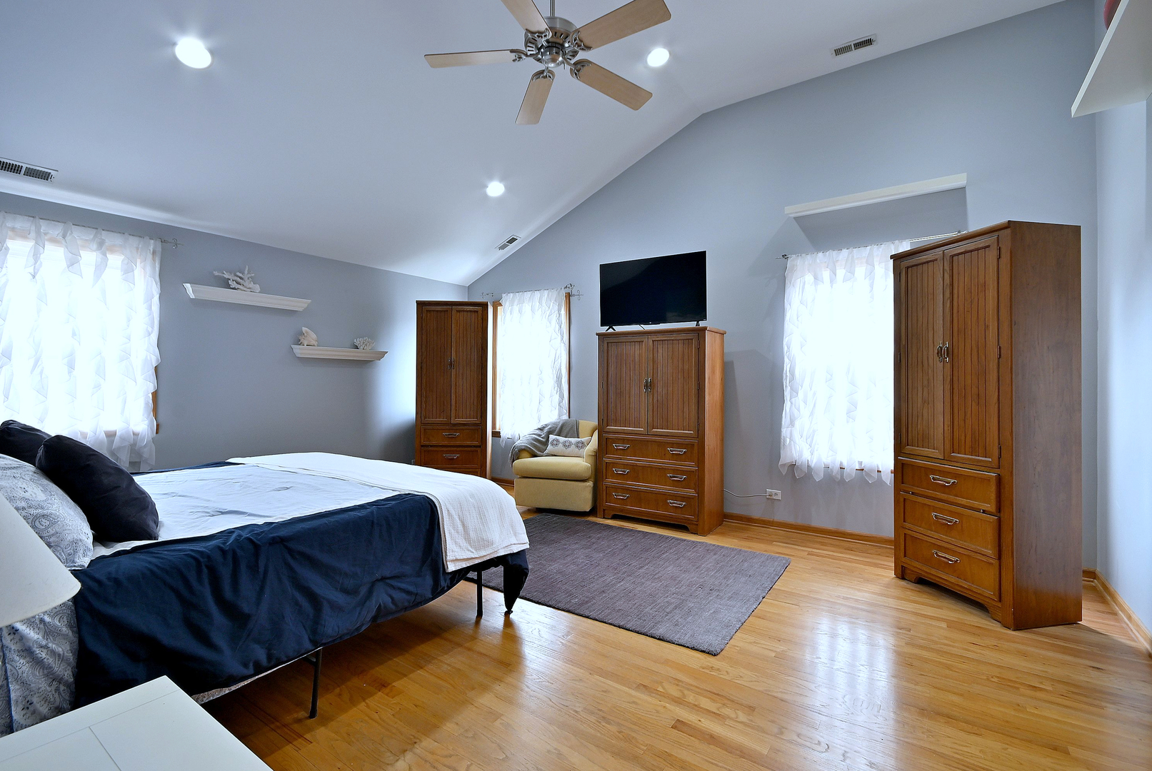 1495 East Algonquin Road Des Plaines, IL 60016 - Photo 35 of 41 a bedroom with a bed dresser and a window