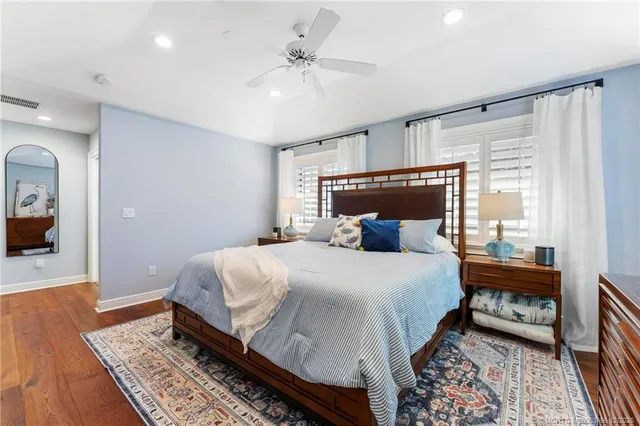 a large kitchen with stainless steel appliances granite countertop a stove a sink dishwasher and a refrigerator