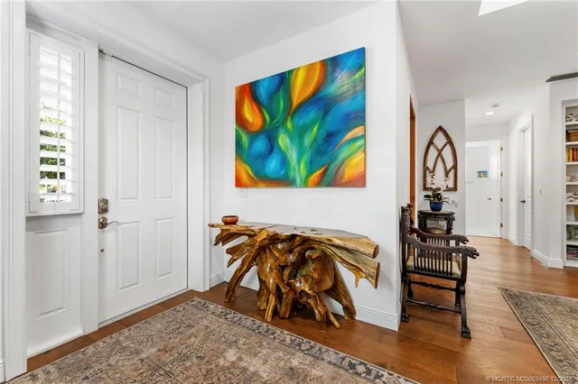 a kitchen with stainless steel appliances granite countertop a stove and a sink
