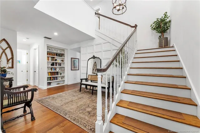a view of front door with wooden floor