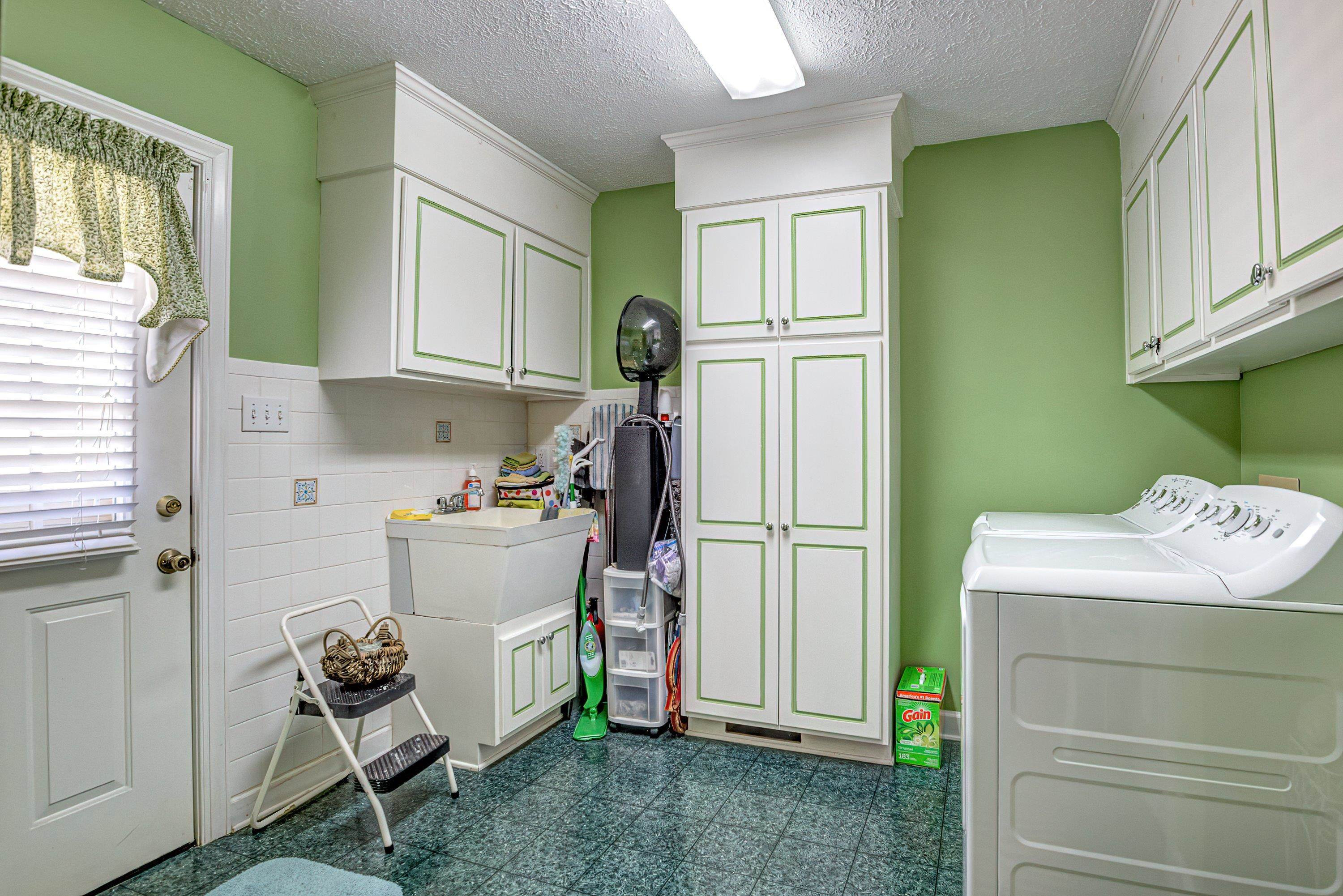 7191 Suttontown Road Faison, NC 28341 - Photo 13 of 40 a room with storage and utility