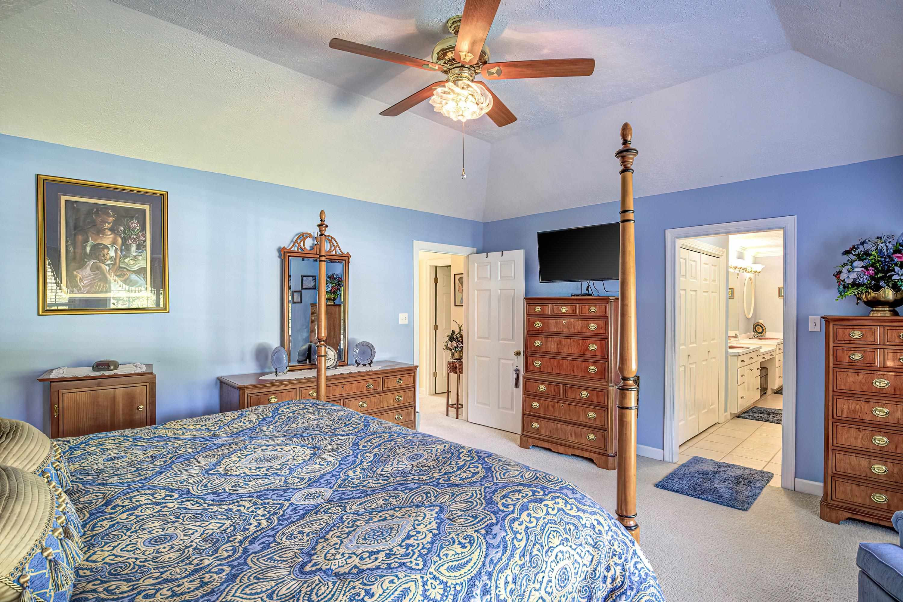 7191 Suttontown Road Faison, NC 28341 - Photo 18 of 40 a bedroom with a bed and a television