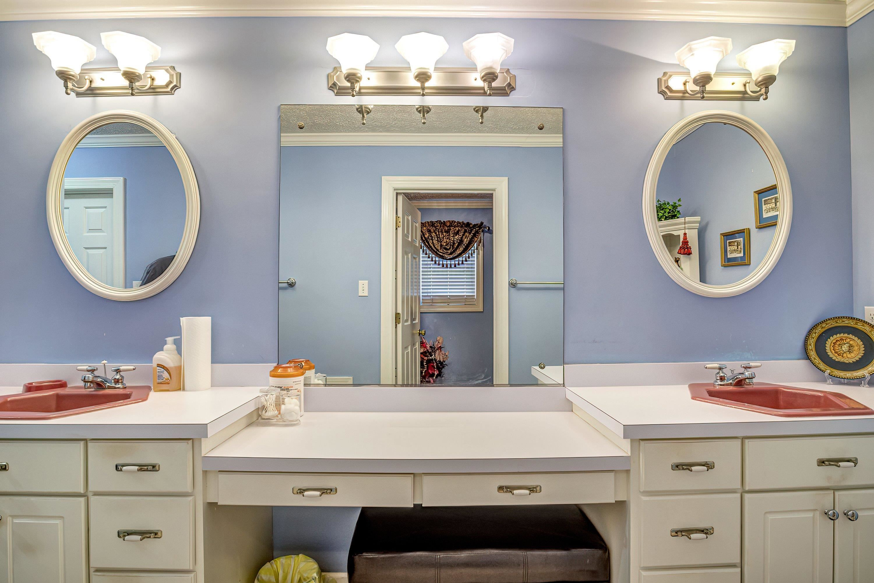 7191 Suttontown Road Faison, NC 28341 - Photo 20 of 40 a bathroom with a sink and a mirror