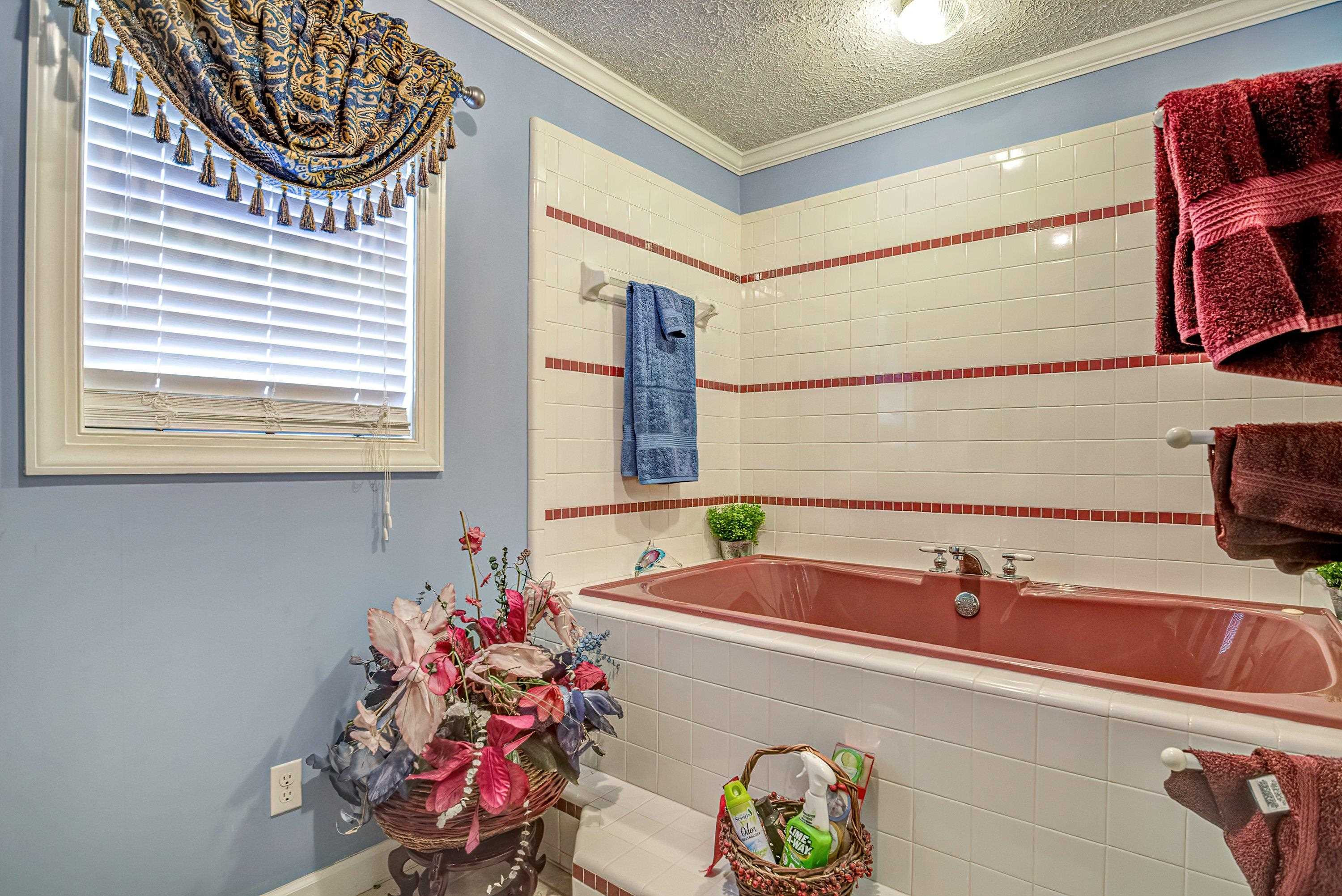 7191 Suttontown Road Faison, NC 28341 - Photo 21 of 40 a bathroom with a sink and a mirror