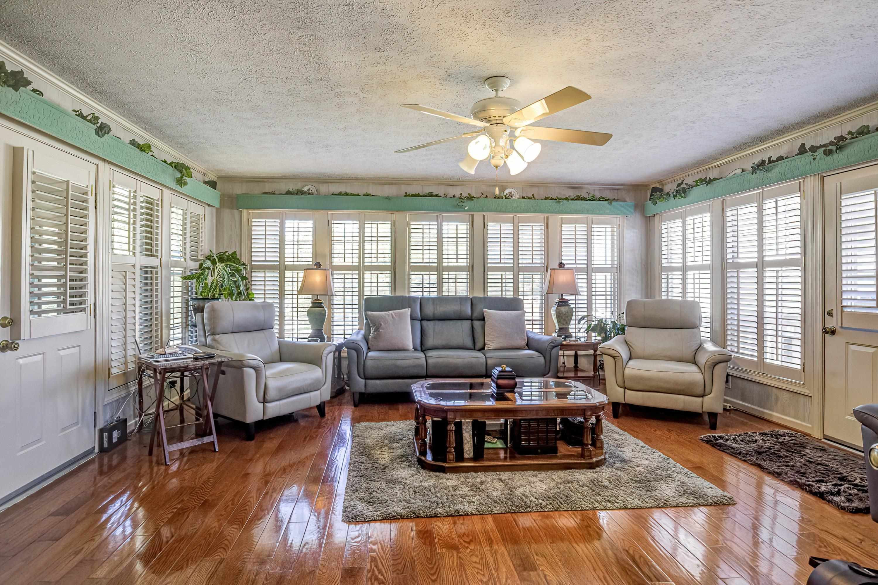 7191 Suttontown Road Faison, NC 28341 - Photo 26 of 40 a living room with furniture and a large window