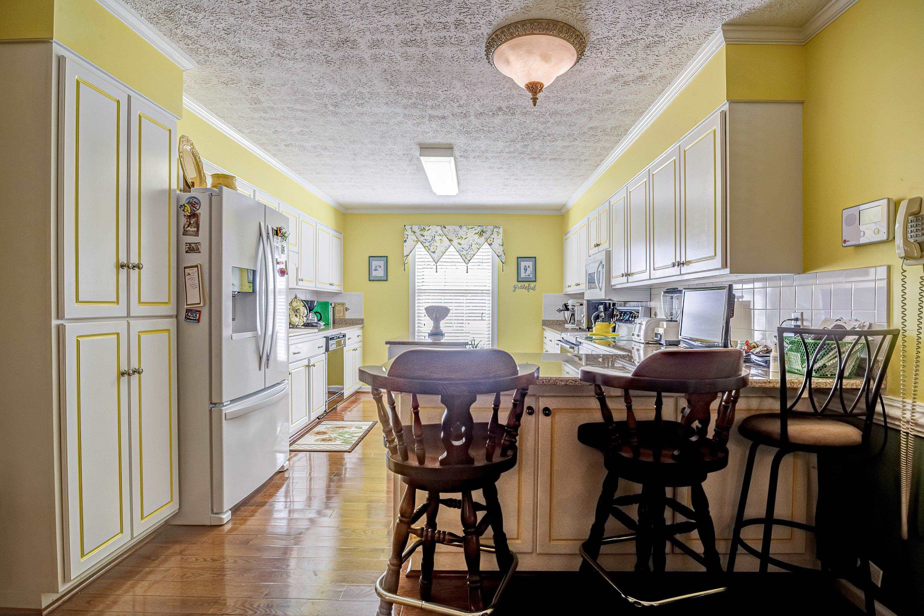 7191 Suttontown Road Faison, NC 28341 - Photo 34 of 40 a view of a dining room with furniture and wooden floor