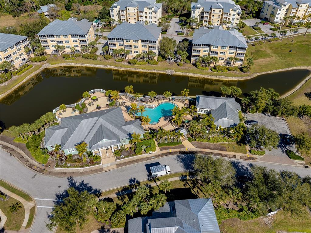 10501 Amberjack Way, Unit 301 Englewood, FL 34224 - Photo 58 of 76 an aerial view of a house with a lake view