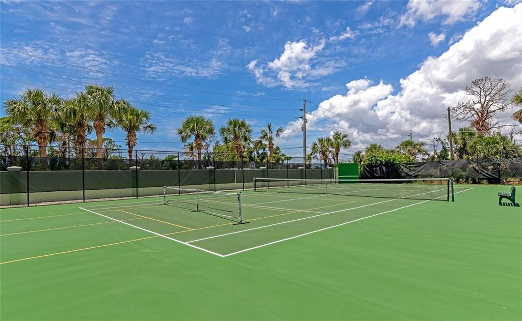 10501 Amberjack Way, Unit 301 Englewood, FL 34224 - Photo 75 of 76 a view of an outdoor space and tennis court