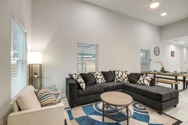 a living room with furniture and a couch