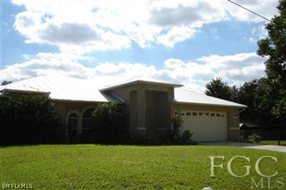 12180 Coyle Road Fort Myers, FL 33905 - Photo 1 of 8 a view of a back yard
