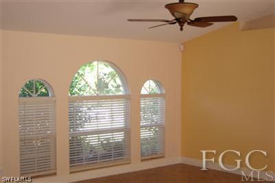 12180 Coyle Road Fort Myers, FL 33905 - Photo 6 of 8 a view of empty room with windows