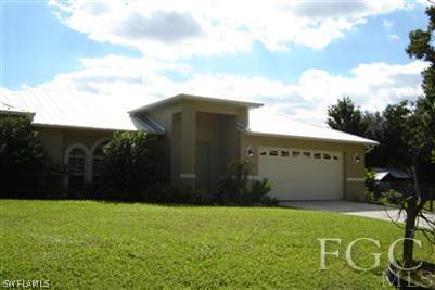 12180 Coyle Road Fort Myers, FL 33905 - Photo 8 of 8 a view of a backyard