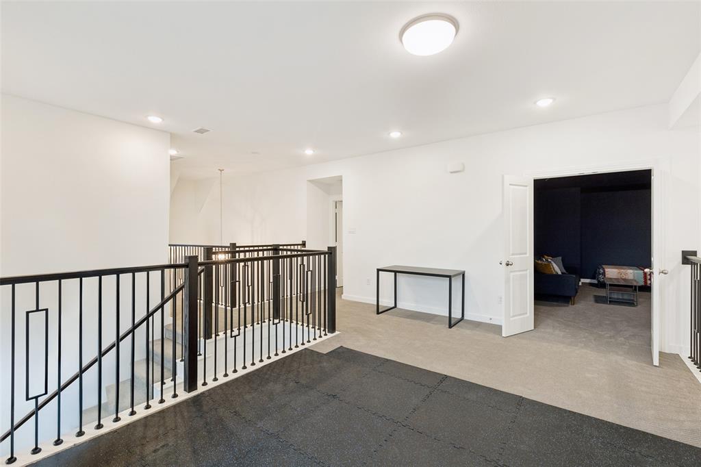 4313 Expedition Drive Oak Point, TX 75068 - Photo 24 of 40 a view of a hallway with seating area