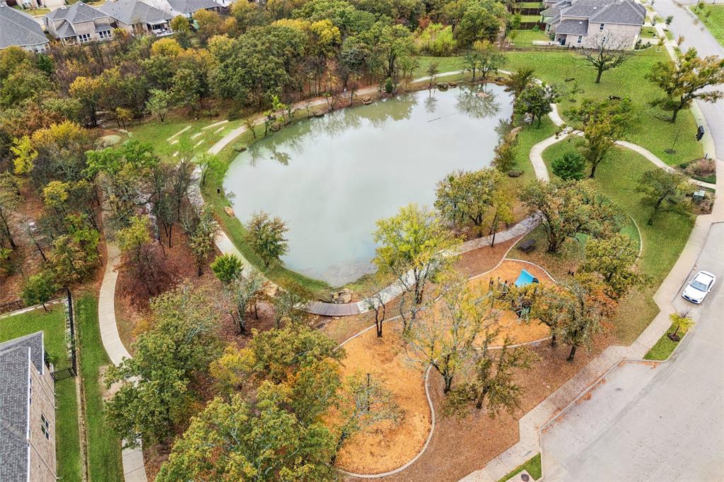 4313 Expedition Drive Oak Point, TX 75068 - Photo 36 of 40 an aerial view of lake residential house with swimming pool