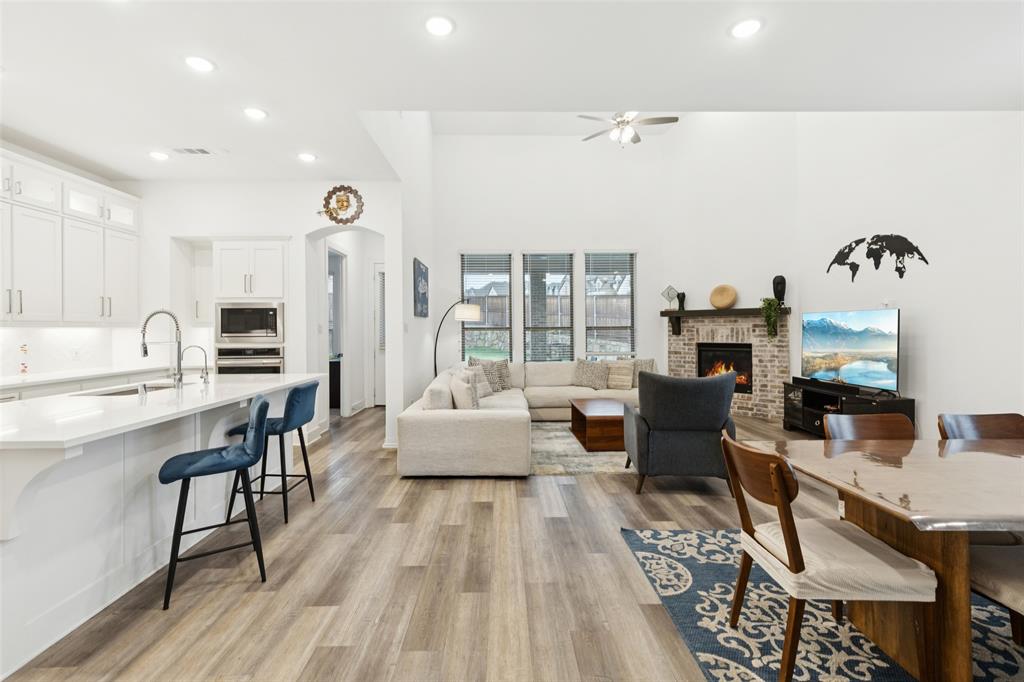 4313 Expedition Drive Oak Point, TX 75068 - Photo 7 of 40 a living room with furniture and wooden floor